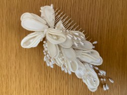 Fabric and pearl comb